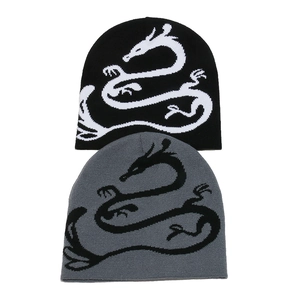 Winter knitted beanies in black and grey featuring traditional dragon jacquard patterns