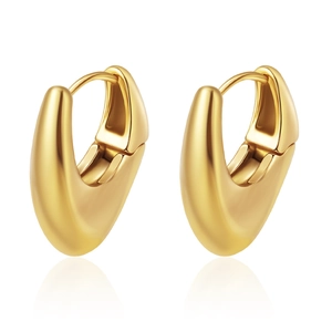 Close-up of polished gold-finished geometric U-shape hoop earrings on a white background