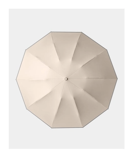 Top view of a beige large automatic reverse umbrella showing its 12-rib sturdy structure