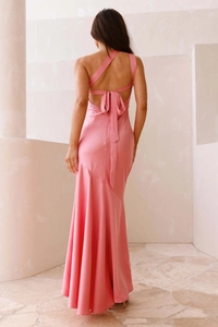 Close-up of pink satin dress featuring a backless design with elegant bow tie detail