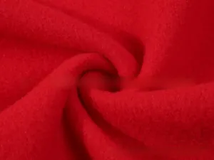 Macro detail of red soft fleece fabric texture showing plush material for hoodies