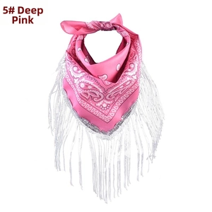 Close-up of deep pink paisley bandana featuring shimmering silver fringe detail