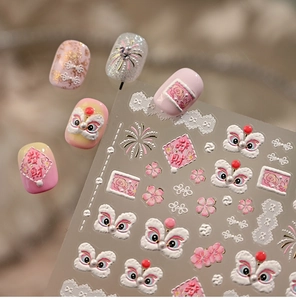 Detail of 5D pink lion dance nail stickers with floral patterns and embossed textures