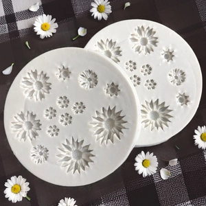 White silicone daisy flower mold for fondant and chocolate DIY cake decorating