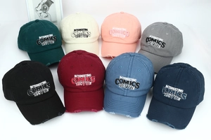 Group of vintage washed cotton baseball caps with distressed brim embroidery