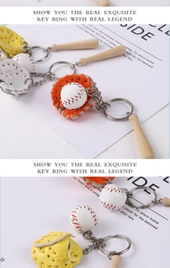 Detail of 3-in-1 baseball keychain featuring mini wooden bat, leather glove and ball