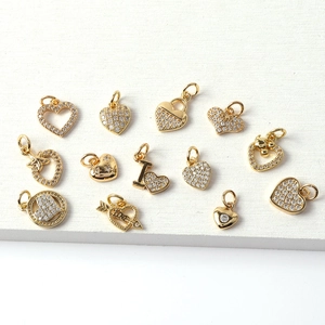 Gold plated heart pendants with zircon inlay in various minimalist jewelry designs