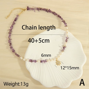 Detail view of pearl and purple stone necklace with sun pendant and size dimensions
