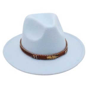 Detail of light blue fedora featuring woven band with beads and metal feather pendant