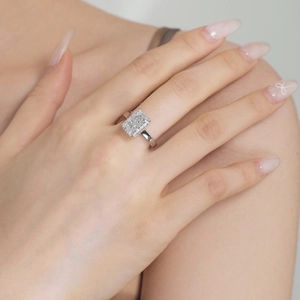 Close-up of S925 silver ring with large rectangular ice flower cut zircon on finger