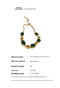 Detailed specs of flower bracelet with emerald rhinestones and adjustable gold chain