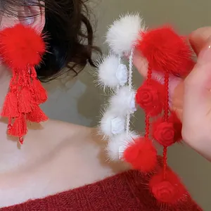 Elegant red pompom drop earrings with floral tassels and crystals for autumn and winter