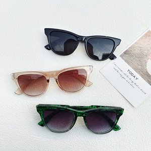 Square fashion sunglasses in black, amber, and floral print on white background
