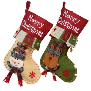 Large Christmas stockings featuring Snowman and Reindeer patterns with Merry Christmas text