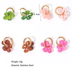 Colorful hollow flower earrings in stainless steel and resin with multiple color options