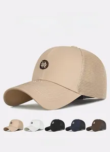 Detail of multi-color mesh baseball caps with embroidered patches and breathable backing