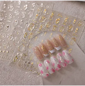 Detailed 3D embossed tulip nail art stickers with gold foil finish and floral patterns