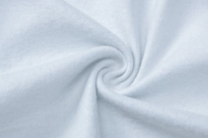 Close-up of soft white fleece fabric texture showing plush fibers and material details
