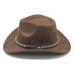 Detail of dark brown faux suede cowboy hat with wide brim and decorative woven band