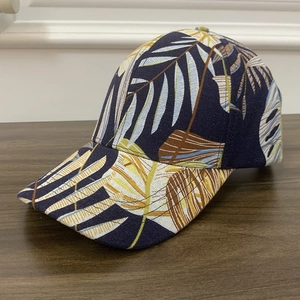 Fashionable baseball cap with tropical leaf print and sun visor for men and women