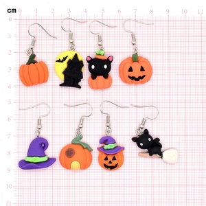 Handmade Halloween resin earrings featuring pumpkin, black cat, and wizard hat designs
