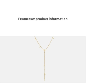 Detail of elegant gold Y-shaped tassel necklace featuring white pearl accents