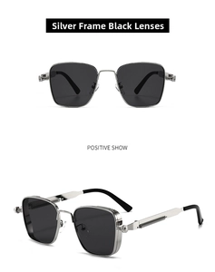 Detail view of silver metal steampunk sunglasses with square frames and spring hinges
