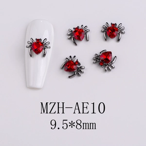 Detail of spider nail art charm with a red heart gem and gunmetal finish, size 9.5x8mm