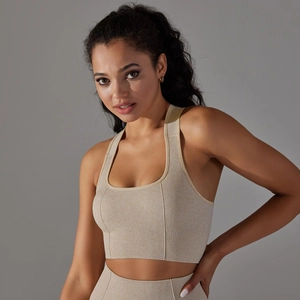 Detailed texture of seamless knitted sports bra with breathable laser-cut perforation