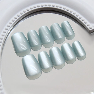 Light blue cat eye press-on nails set with shimmering glossy finish and square-round shape