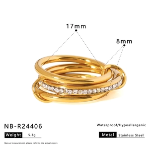 Detail view of multi-layered 18K gold plated ring with paved zircons and 8mm width
