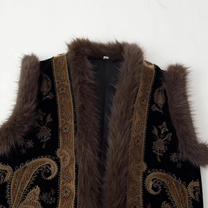 Women's black and brown vest with gold bead embroidery and brown faux fur trim