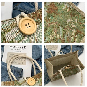Detail view of floral jacquard fabric with wooden button and braided rope handles