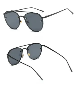 Detail view showing the sleek black metal frame and double bridge of aviator sunglasses
