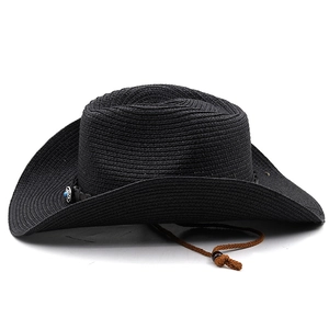 Detail of black straw cowboy hat featuring blue turquoise stone concho and wind rope