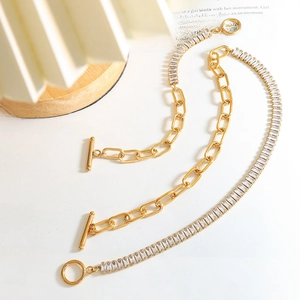Gold paperclip chain necklace and zircon tennis bracelet set with toggle clasp