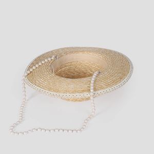 Elegant straw sun hat with large brim and decorative pearl chain strap for women