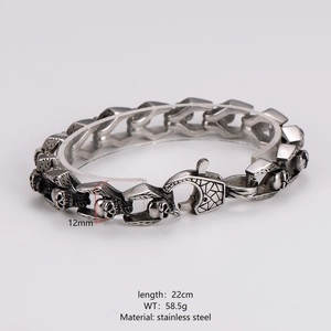 Vintage stainless steel skull bracelet for men in silver finish with 12mm wide links