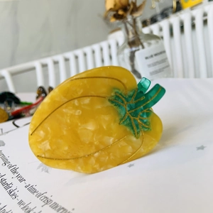 Creative pumpkin vegetable hair claw clip in yellow acetate for elegant hair styling
