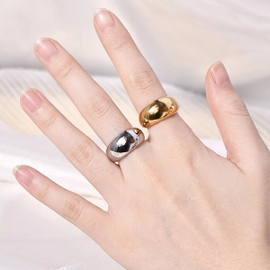 Minimalist wide dome rings in polished gold and silver finish for a modern bold look