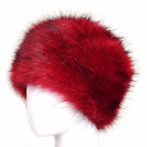 Winter faux fox fur hat in deep red color with thick plush texture and flat top design