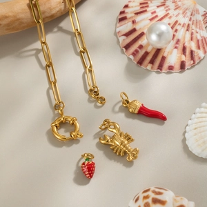 18K gold-plated paperclip chain necklace with lobster, chili, and strawberry charms