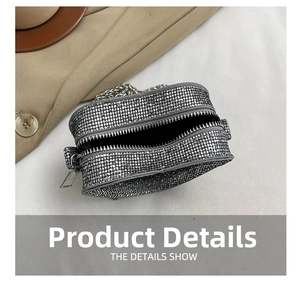 Detailed view of silver sequined heart bag with metal zipper and fine chain strap