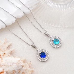 Elegant water drop necklaces with blue heart-cut crystals and double-layer zircon halos