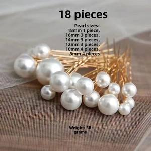 Detail view of 18 piece bridal pearl hair pins set with various sizes and golden U-shaped clips