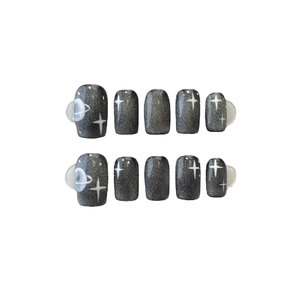 Set unghie press-on grigio cat-eye con motivi di stelle bianche e Saturno