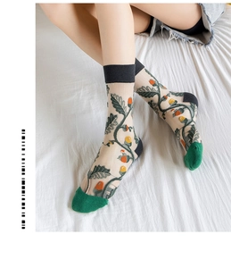 Detailed embroidery of leaves and fruit on cream sheer tulle crew socks for women