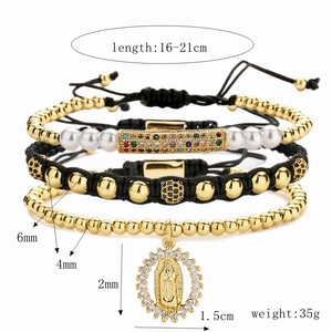 Detailed view of gold multi-layer bracelets with Virgin Mary pendant and bead size specs