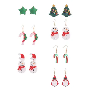 Handmade polymer clay Christmas earrings set featuring snowman and tree designs