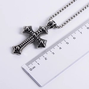 Punk vintage silver stainless steel cross pendant with detailed carved patterns and ball chain